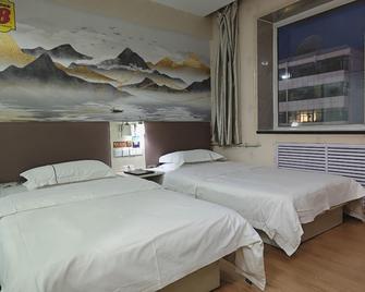Super 8 by Wyndham Linxia Da Shi Zi - Linxia - Bedroom