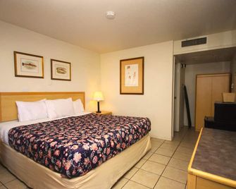Apple Inn and Suites - Wheat Ridge - Bedroom