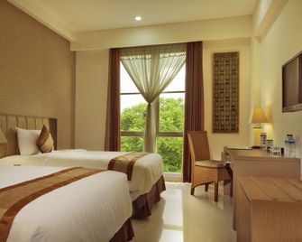 Hotel On The Rock - Kupang - Schlafzimmer