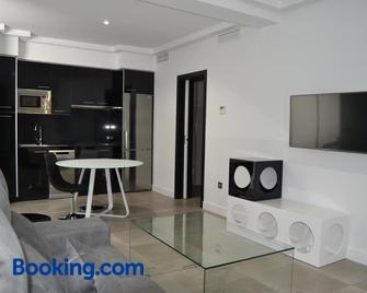 Apartamentos Las Palmeras - Palma del Río - Wohnzimmer