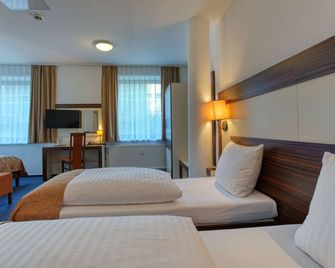 Centro Hotel Braunschweig, Trademark Collection by Wyndham - Braunschweig - Slaapkamer