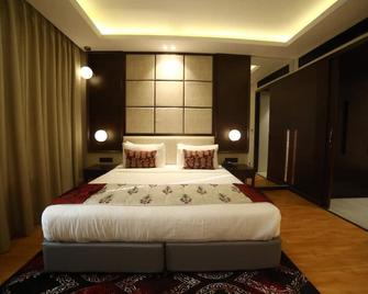 Hotel Ortus - Kota - Schlafzimmer