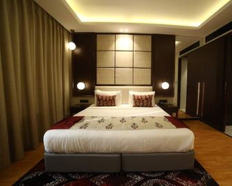 Hotel Ortus - Kota - Schlafzimmer
