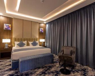 Aman Suites Hotel - Al mhalh - Abha - Camera da letto