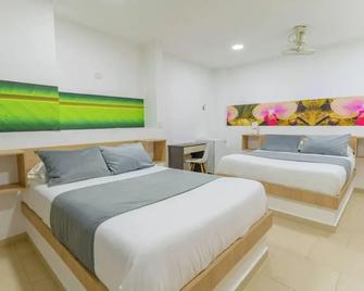 Hotel Plataneras Plaza - Apartadó - Habitación