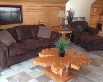 All Seasons Log Cabin Rental - Empire - Living room