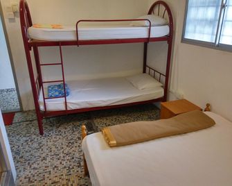 ديسكفري مالاكا هوستل - مالاكا - غرفة نوم