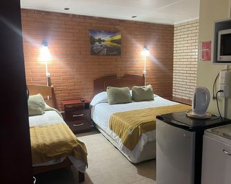 Hostal Maipu Street - פונטה ארנס - חדר שינה