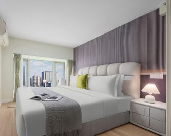 Orange Joy Hotel (Meixi Lake West Metro Station Branch) - Changsha - Bedroom