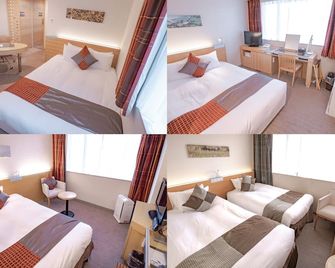 هوتل كيهان كيوباشي جراند - أوساكا - غرفة نوم