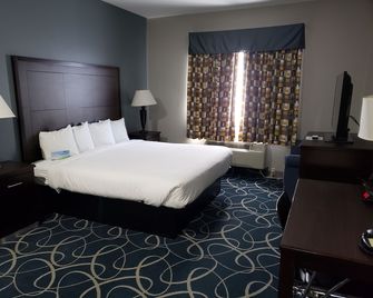 Days Inn & Suites by Wyndham Cleburne TX - Cleburne - Ložnice