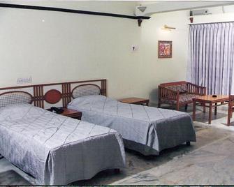 Amogha International Hotel - Chitradurga - Bedroom