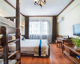 Memory Inn Guilin Central - Kuej-lin - Ložnice