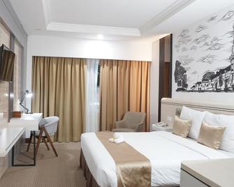 Abadi Hotel Malioboro Yogyakarta - Yogyakarta - Soveværelse