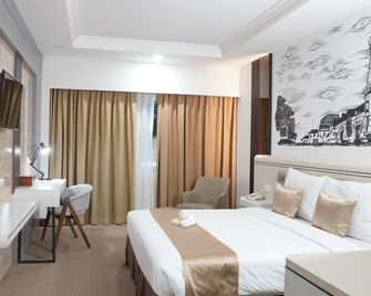 أبادي هوتل ماليوبورو جوجيا - يوغياخيرتا - غرفة نوم