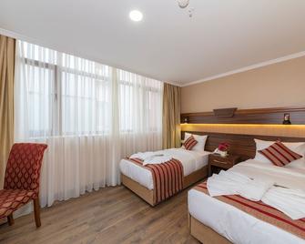 Hotel Prassino Nissi - Moraitika - Schlafzimmer