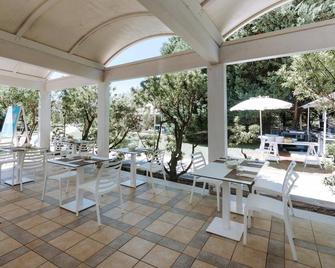 Nicolaus Club La Giurlita - Lido Marini - Terasa