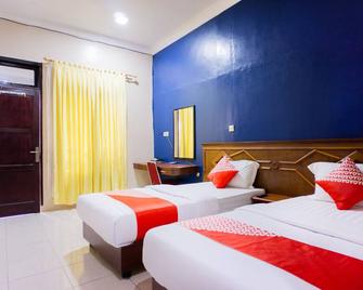 OYO 1636 Wisma Kuta Karang - Lhoksumawe - Habitación