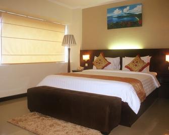 Royal Mamberamo Hotel - Sorong - Schlafzimmer