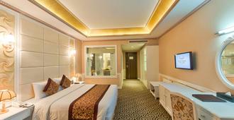 Muong Thanh Luxury Song Lam Hotel - Vinh City - Schlafzimmer
