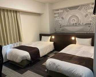 Hotel Sunny Inn - Kanonji - Camera da letto
