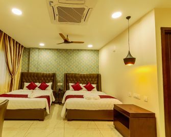 Hotel Akshay Grand - Chengalpattu - Bedroom