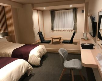 Aizu Tsuruya Hotel - Aizuwakamatsu - Ložnice
