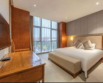 Anyang Wanhui Hotel (Huanghe Avenue Normal University) - Anyang - Slaapkamer