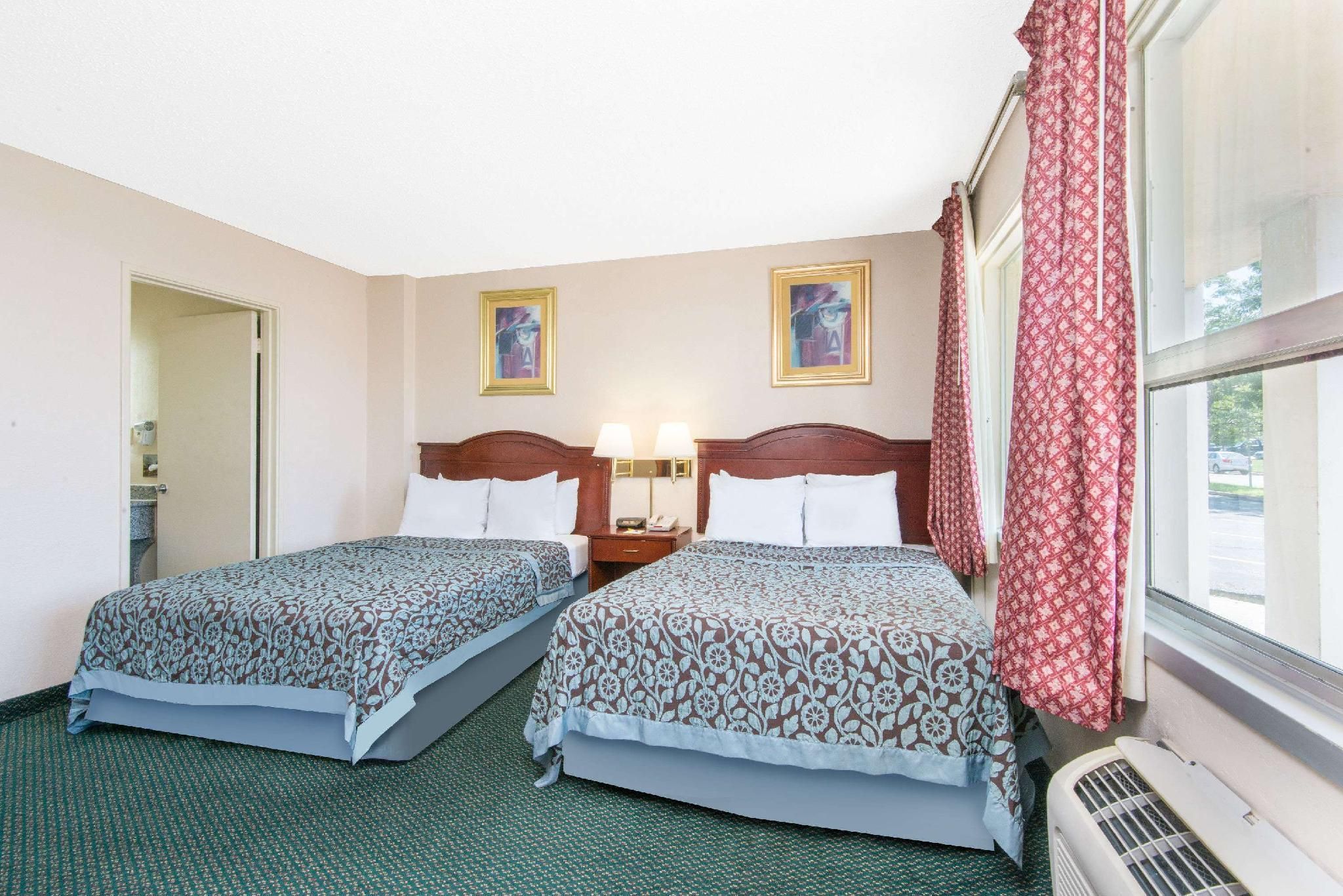 Days Inn and Suites by Wyndham Wichita East - וויצי'טה - חדר שינה