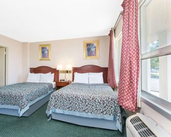 Days Inn and Suites by Wyndham Wichita East - וויצי'טה - חדר שינה