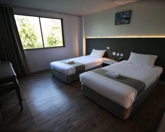 R.S. Hotel - קאנצ'אנאבורי - חדר שינה