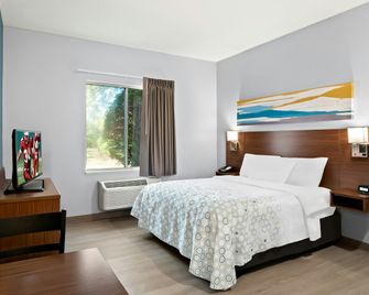 HomeTowne Studios by Red Roof East Lansing - Okemos - Okemos - Bedroom