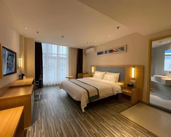 City Comfort Inn Deyang Shifang Yonghu Park - Deyang - Bedroom