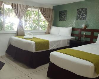 Hotel Tazumal House - San Salvador - Bedroom