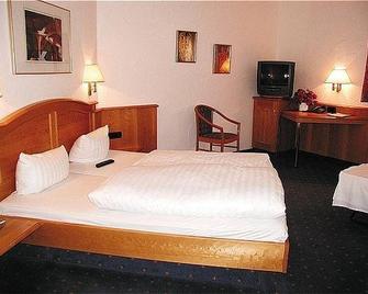 Metzgerei Gasthof Oberhauser - Hotel zur Post - Egling - Camera da letto
