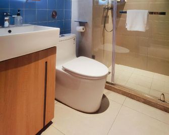 Home Inn Neo Dongying East City Caozhou Road Center - Dongying - Habitación