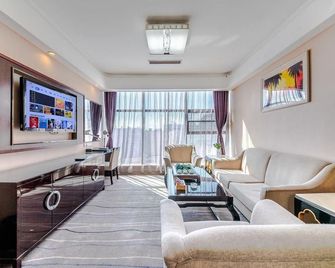 민롄 트라이엄프 호텔 - 칭다오 - 침실