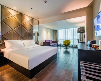 Victoria Hotel (Foshan Zumiao Metro Station Lingnan Tiandi Branch) - Foshan - Schlafzimmer