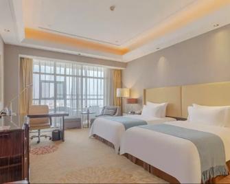Landbridge Jinjiang Hotel - Rizhao - Ložnice