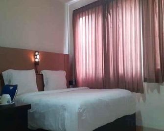 Lerina Hotel & Conference Syariah Banjarbaru - Banjarbaru - Bedroom