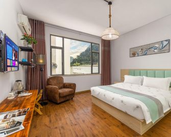 Yangshuo Jibaihe Hostel - Guilin - Bedroom