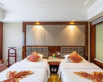 Jin Li Hua Grand Hotel - Shaoyang - Bedroom