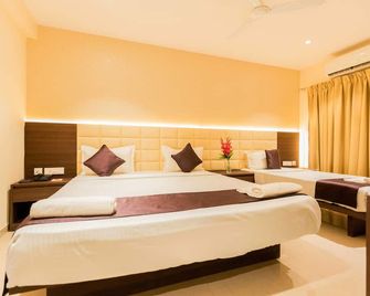 إل واي إن كيو سي آي سي أو - كولكاتا - غرفة نوم