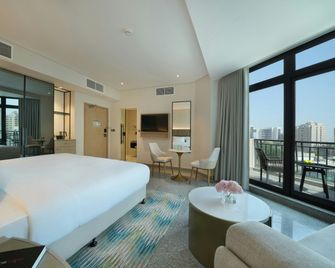 Arabian Park Dubai, an Edge by Rotana Hotel - Dubai - Bedroom