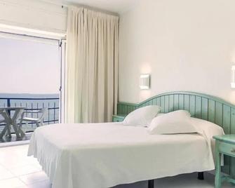 Hotel Restaurant Juanito Platja - Sant Carles de la Ràpita - Slaapkamer