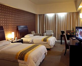 Grand Elite Hotel Pekanbaru - Pekanbaru - Bedroom