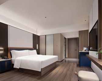 Mehood Lestie Hotel- Changsha South Sation Branch - Changsha - Bedroom