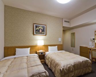 Hotel Route-Inn Tomakomai Ekimae - Tomakomai - Bedroom