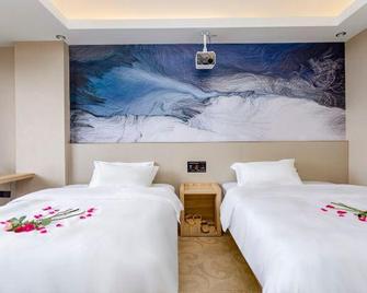 Heliyuan Zhixiang Hotel (Danzhou Summer Square) - Danzhou - Habitación