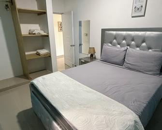 Media Luna Apartment - Cabrera - Bedroom